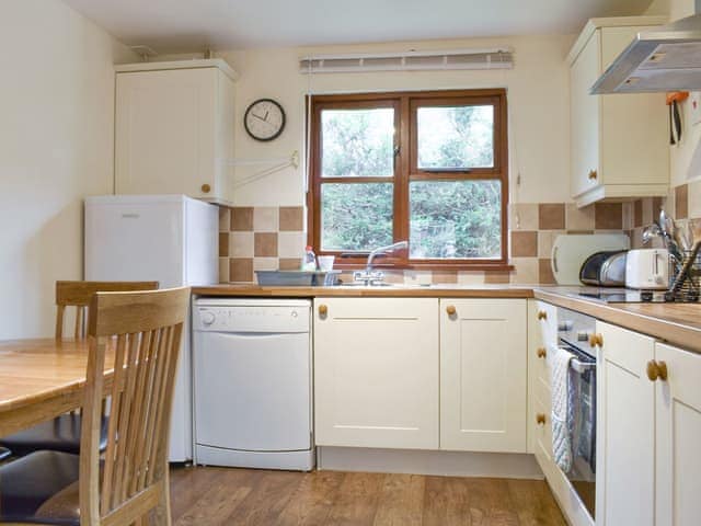 Fully appointed kitchen with dining area | Oak Lodge - Eversleigh Woodland Lodges, Shadoxhurst, near Ashford