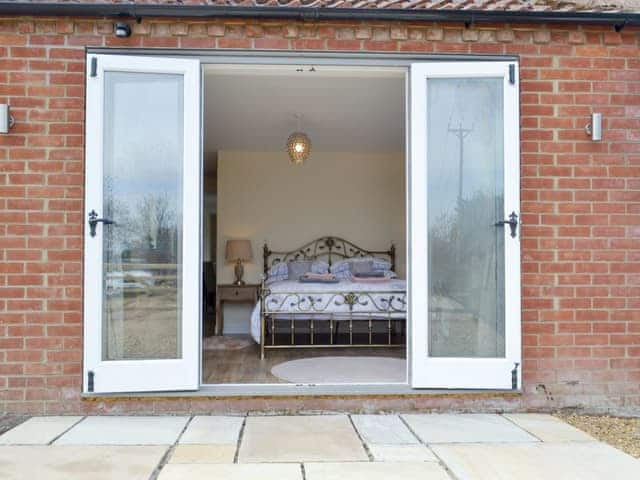 Second patio area with access to the double bedroom | Hare&rsquo;s Home - Thursford Holidays, Thursford, near Fakenham