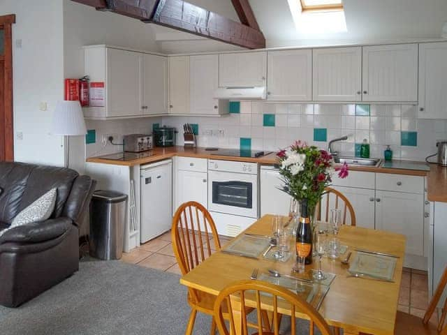 Convenient dining area and kitchen | Sparrow - Manor Court Cottages, Shipton Gorge