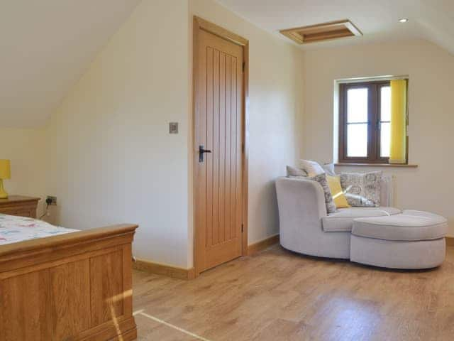 Peaceful double bedroom with seating area | Stepen Cottage - Stepen Cottages, Chard