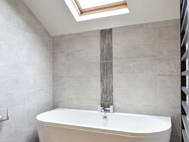 Upper floor bathroom with bath and separate shower cubicle | New House, Windermere