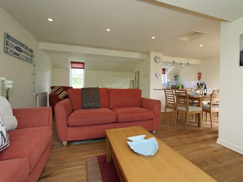 Lovely living area with adjacent kitchen/diner | Watermark - Glendorgal, Newquay
