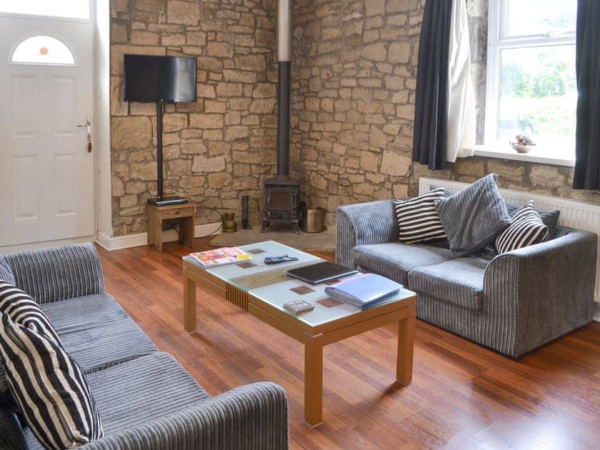 Welcoming living area with wood burner | Stable Cottage - Railway Cottages, Acklington, near Amble