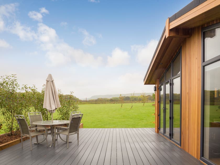 Expansive decked area with far reaching countryside views | Cedar Lodge, South Downs - South Downs Lodges, Hassocks