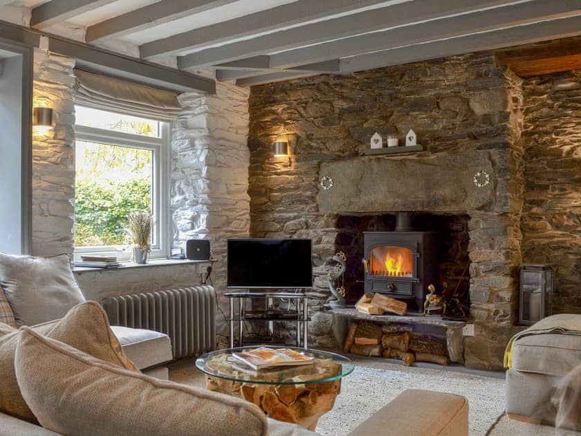 Delightful living/ dining room with cosy wood burner | Coach House - Grange End Cottages, Grasmere