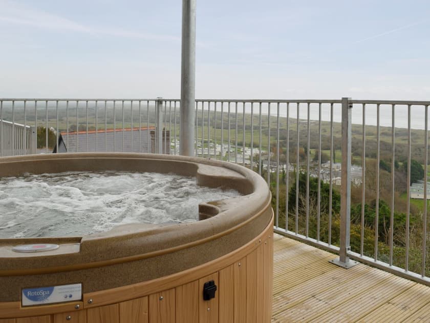 Luxurious hot tub on the balcony | Sunbeam - Pendine Manor Apartments, Pendine, near Laugharne