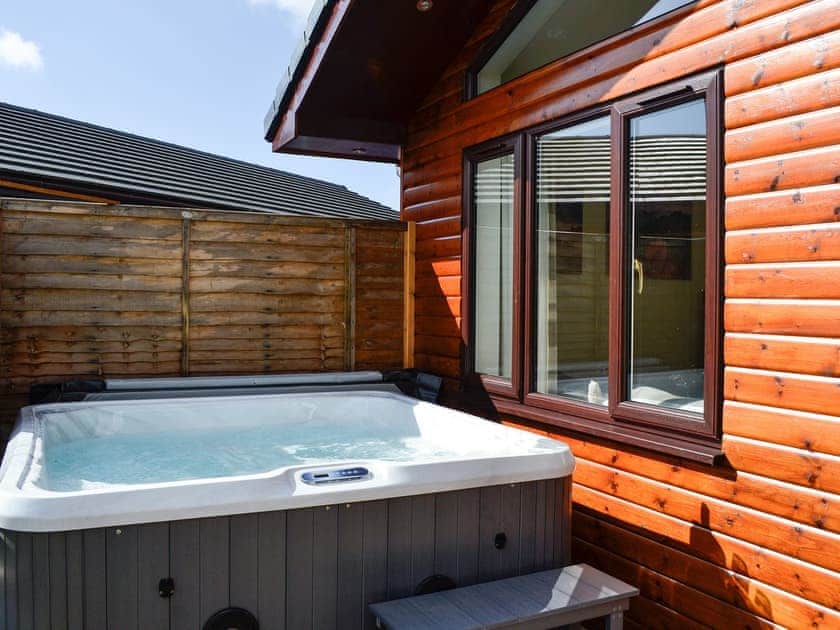 Private hot tub | The Spey - Woodburn Lodges, Milton of Campsie, near Kirkintilloch