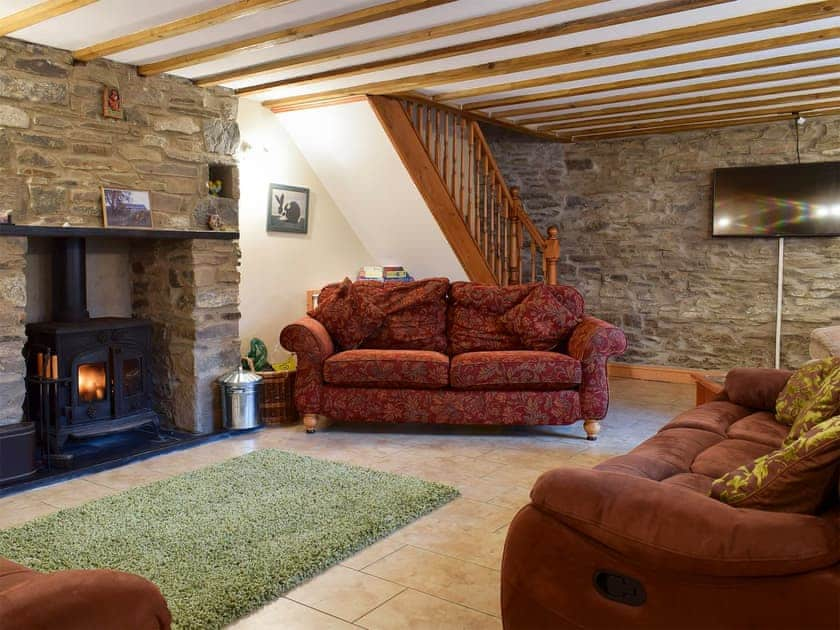 Cosy living area with wood burner | Penrhiw - Penrhiw Cottages, Llangeitho, near Tregaron