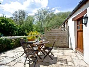 Patio area with outdoor furniture | The Smithy - Park Mill Farm, Chulmleigh