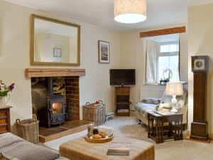 Charming living room with wood burner | Chestnut Cottage, Hellifield, near Settle 