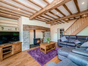 Spacious living room with wood burner | Rhiew Banc, Bwlch-y-ffridd, near Newtown