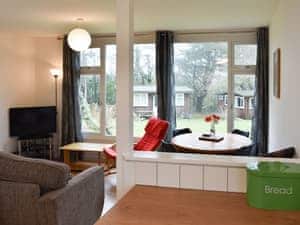 Kitchen through to the living and dining areas | Chalet 7 - Mount Hawke Holiday Bungalows, Mount Hawke, near Redruth