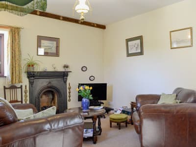 Comfortable living room | Swallows Return - Moresby Hall Farm, Whitehaven