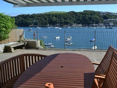 Large sun terrace, with garden furniture and stunning views of the river | Roadstead, Fowey