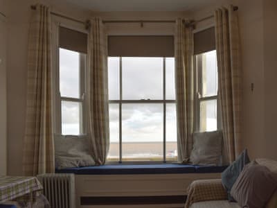 Open-plan living area with unspoiled views of the coast | Flat 3 Sea View - Moray Apartments, Lowestoft