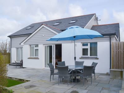 Wonderful paved patio area with table and chairs | Driftwood, Port Isaac