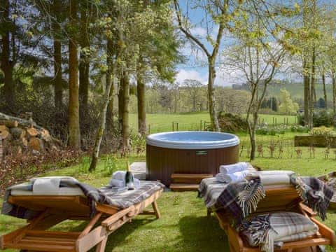 Hot tub in a delightful setting | The Indie House - Ochtertyre Luxury Holiday Cottages, Ochtertyre, near Crieff