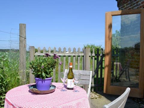 Patio area with outdoor furniture | The Studio, Hinton, near Saxmundham