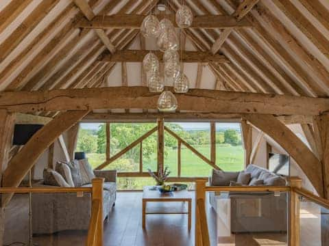 Impressive mezzanine sitting room | Norwood Barn, Wormshill