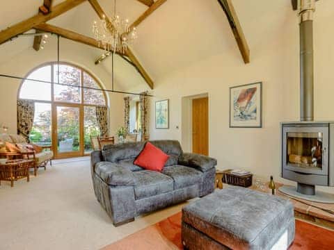 Luxurious living room with wood burner | Courtyard Lodge, Rufford, near Newark