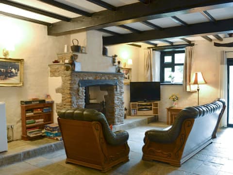 Cosy living area | The Carriage House - Middle Cowley Farm Cottages, Parracombe, near Ilfracombe