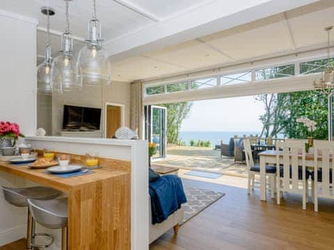 Open plan living space with bi-folding doors | Beach Retreat, Corton, near Lowestoft