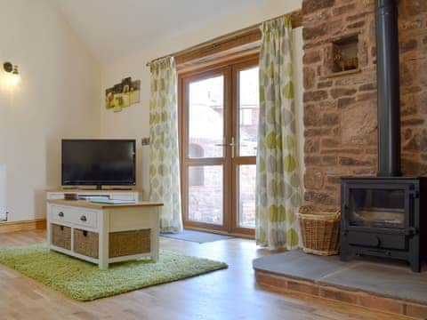 Delightful living area with wood burner | Little Allaston Farm Holidays - Lambing Shed - Little Allaston Farm, Lydney