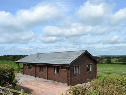 Detached holiday cabin overlooking open farmland | West Middlewick Farm - Dartmoor - West Middlewick Farm , Nomansland, near Tiverton