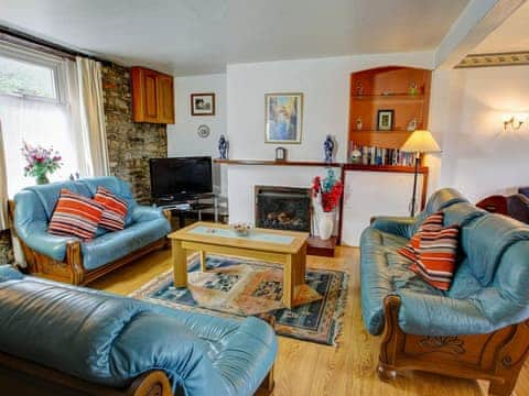 Welcoming living area with open fire | Pleasant Maris, East Ogwell, near Newton Abbot