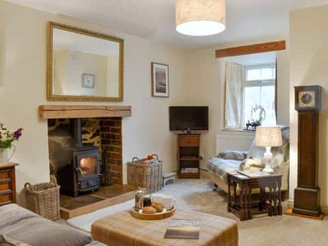 Charming living room with wood burner | Chestnut Cottage, Hellifield, near Settle 