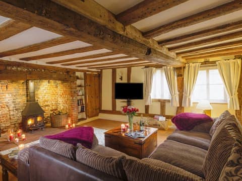 Stunning living room with wood burner | Oak Cottage - Serenity Cottages, Stoke Ash, near Eye