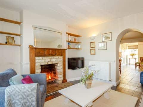 Delightful living room with an open fire | Jack&rsquo;s Cottage, Easton On The Hill, near Stamford