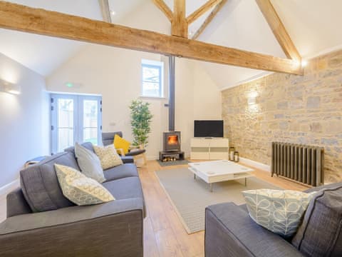 Delightful beamed living area | Russet - Home Farm Holiday Cottages, Badgworth, near Axbridge
