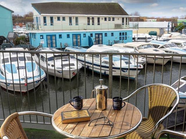 Balcony overlooking the water | Heron - Daisy Broad Lodges, Wroxham