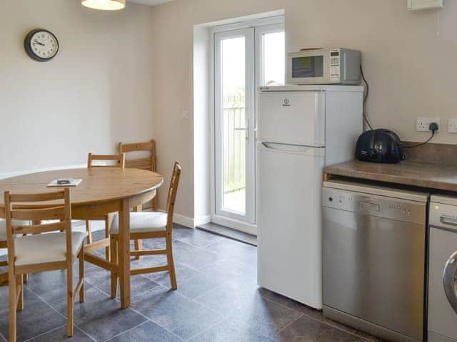 Light and airy dining area within kitchen | Taikoo, Beadnell