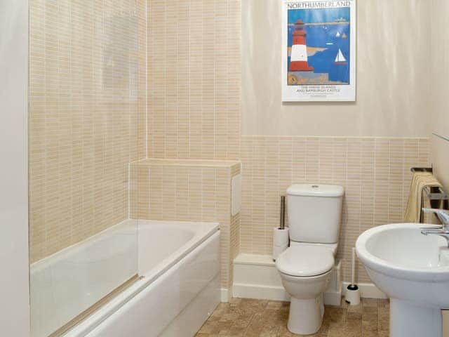 Family bathroom with shower over bath | Taikoo, Beadnell