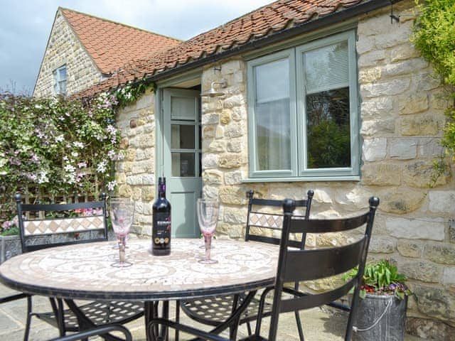 Patio area with outdoor furniture | Ash Garth Cottage, Little Barugh, near Pickering