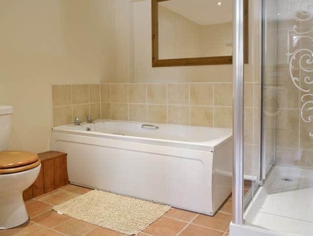 Bathroom with bath and separate shower cubicle | Pond Cottage - Moor Farm Stable Cottages, Foxley, near Fakenham