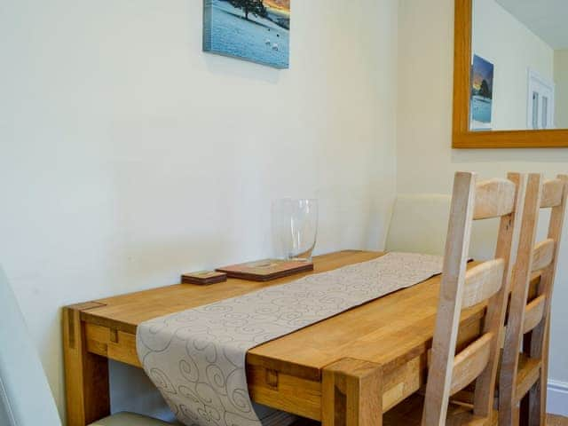 Modest dining area | Ghillie Cottage, Cockermouth