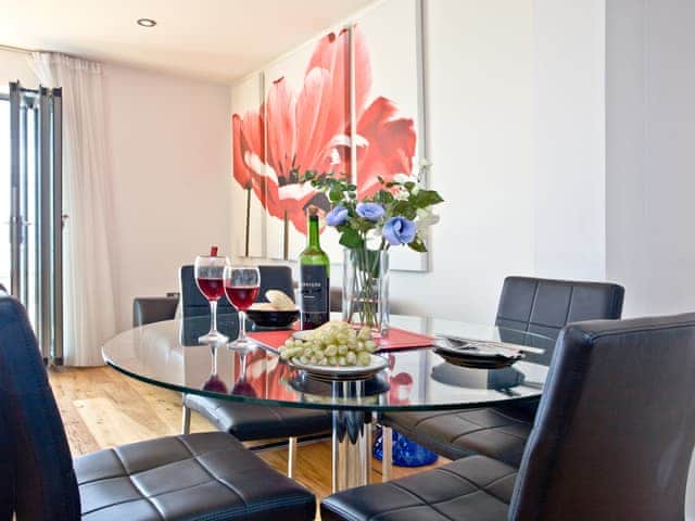 Elegant dining area | 12 Ocean Point Penthouse - Ocean Point, Saunton