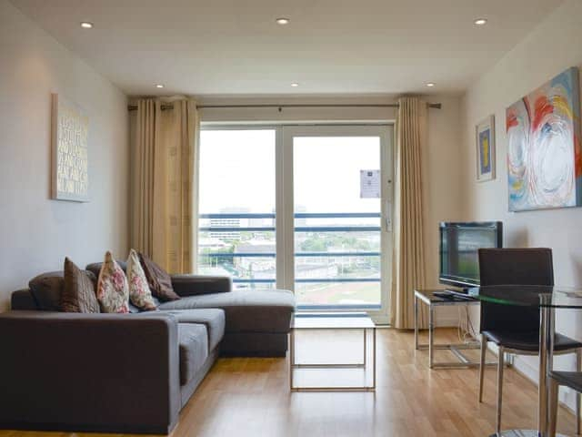 Welcoming living area with Juliette balcony | Gunwharf Quays Apartments - The One Bedroom &rsquo;A&rsquo; - Gunwharf Quays Apartments , Gunwharf Quays, near Portsmouth