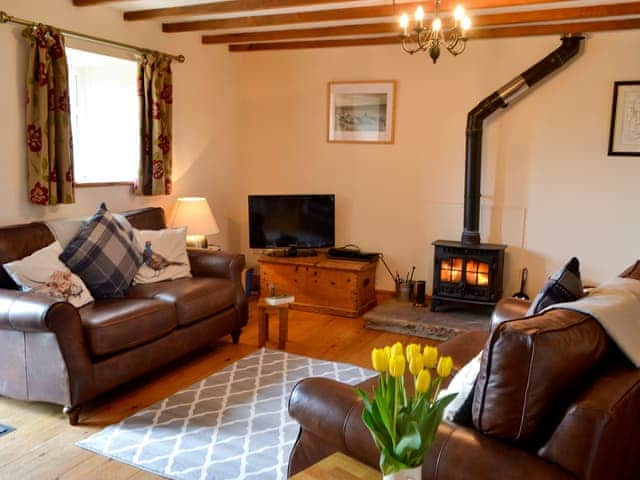 Cosy lounge Area with wood burning stove | The Stable - Knoppingsholme Cottages, Tarset, near Bellingham