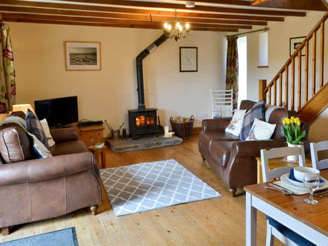 Cosy lounge Area with wood burning stove | The Stable - Knoppingsholme Cottages, Tarset, near Bellingham