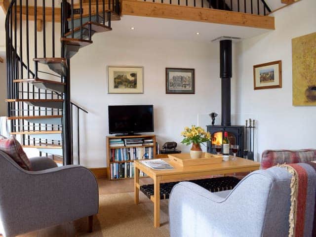 Cosy living area with wood burner | The Cottage, Richards Castle, near Ludlow