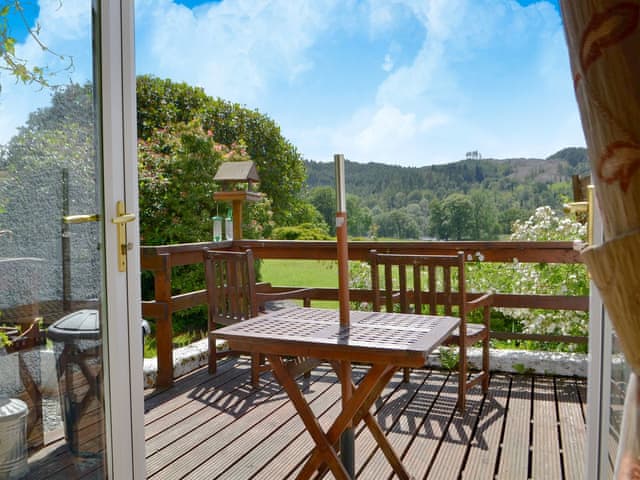 Decking area with wonderful ountryside views | Little Esthwaite Cottage, Little Ees Wyke, Near Sawrey