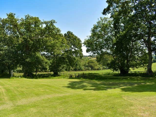 Large garden and grounds | The Oaks - Trecan Farm Cottages, Lanreath, near Looe