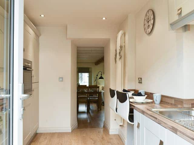 Well-equipped kitchen with casual dining space | Easter Cottage, Bamford, near Hope Valley