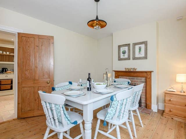 Dining room with wooden floor | Sea Lavender Cottage - Hall Lane Cottages, Thornham, near Kings Lynn