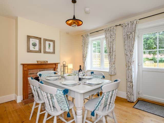 Dining room with wooden floor | Sea Lavender Cottage - Hall Lane Cottages, Thornham, near Kings Lynn