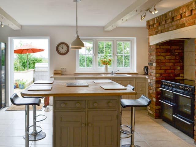 Fully appointed kitchen with dining &rsquo;island&rsquo; | Walnut Tree House, Tilney St Lawrence, near Kings Lynn